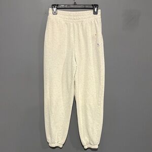American eagle cream sweatpants with flower detail